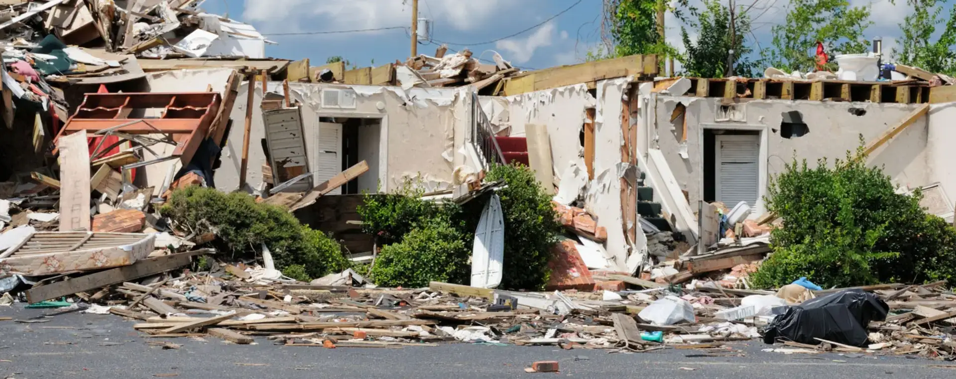 Severe structural damage to a house after disaster emphasizes the need for resilient concrete construction in vulnerable areas